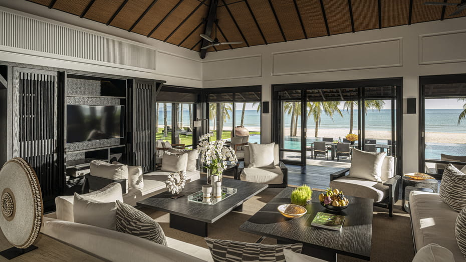 Spacious beachfront villa living room with sea views at Four Seasons Resort The Nam Hai.