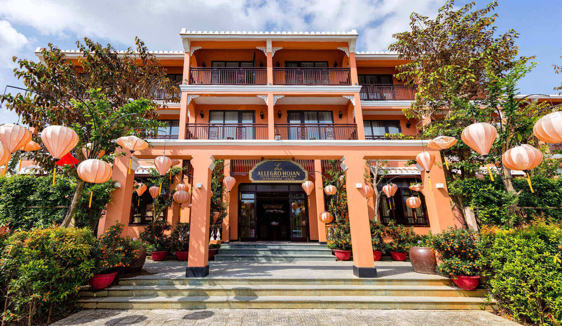 Allegro Hoi An exterior showcasing heritage-inspired boutique hotel architecture design