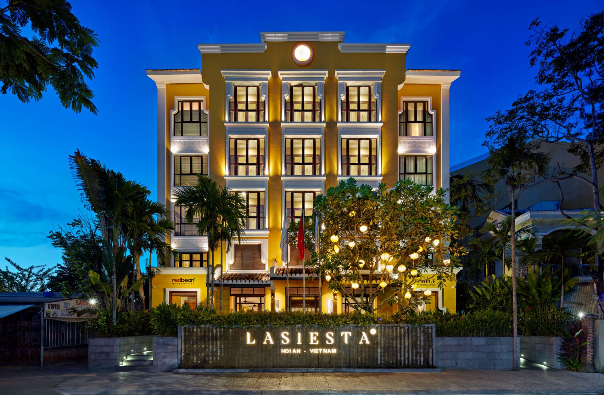 La Siesta Hoi An Resort exterior at night