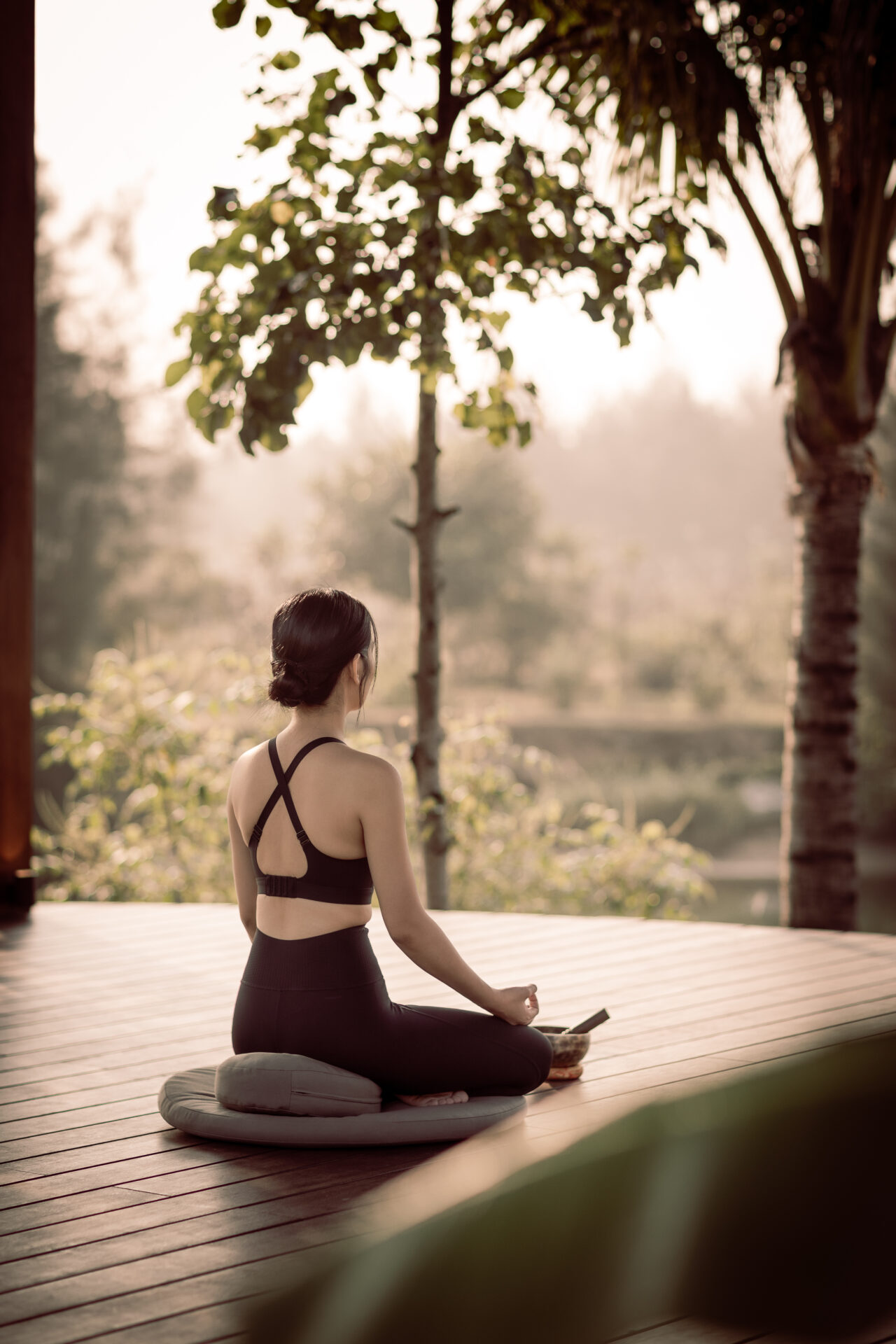 Morning yoga and meditation session at Namia River Retreat surrounded by tropical greenery and peaceful riverside atmosphere.