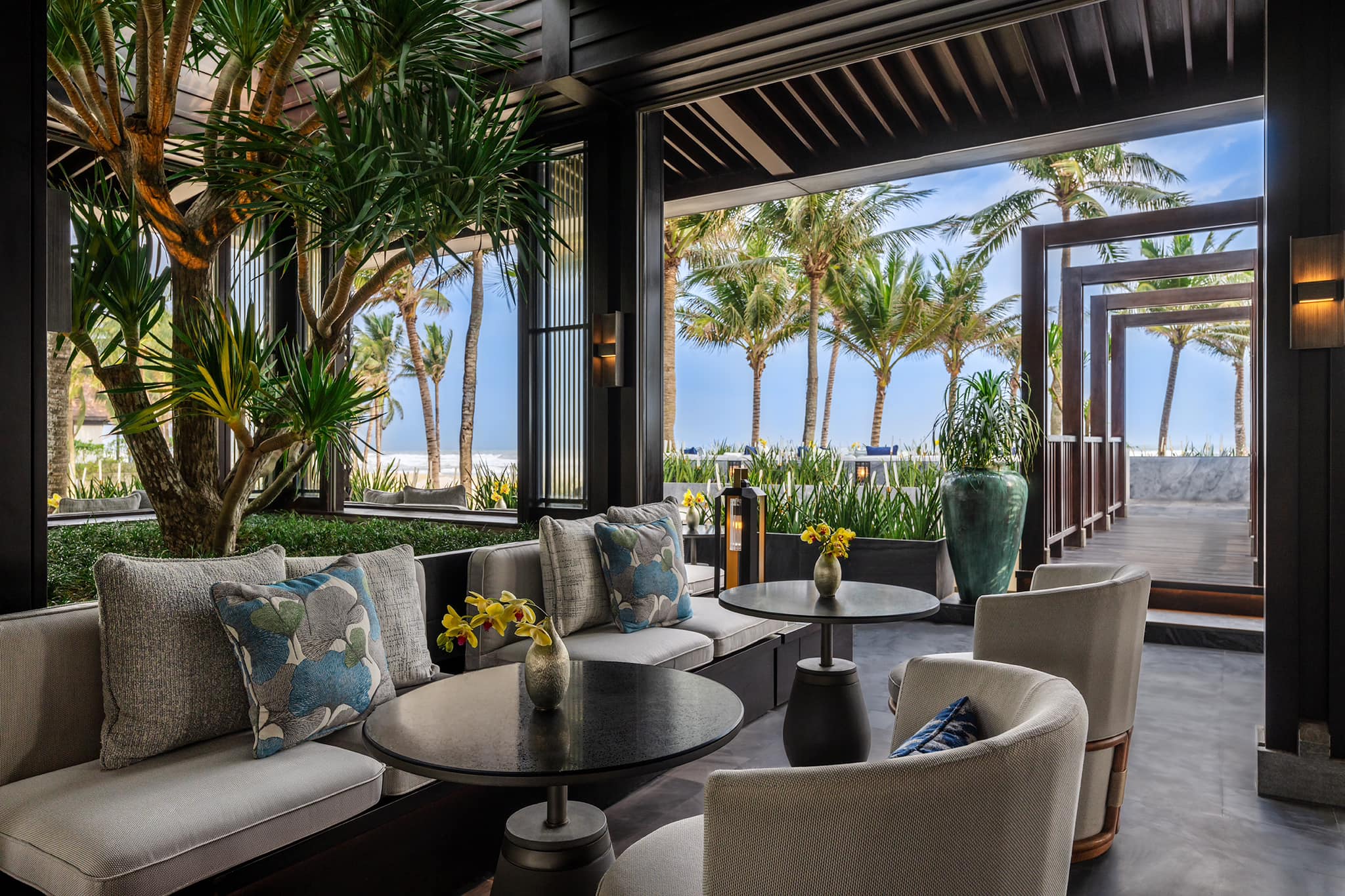 Ocean-view lounge area with modern décor at Four Seasons Resort The Nam Hai, Hoi An.