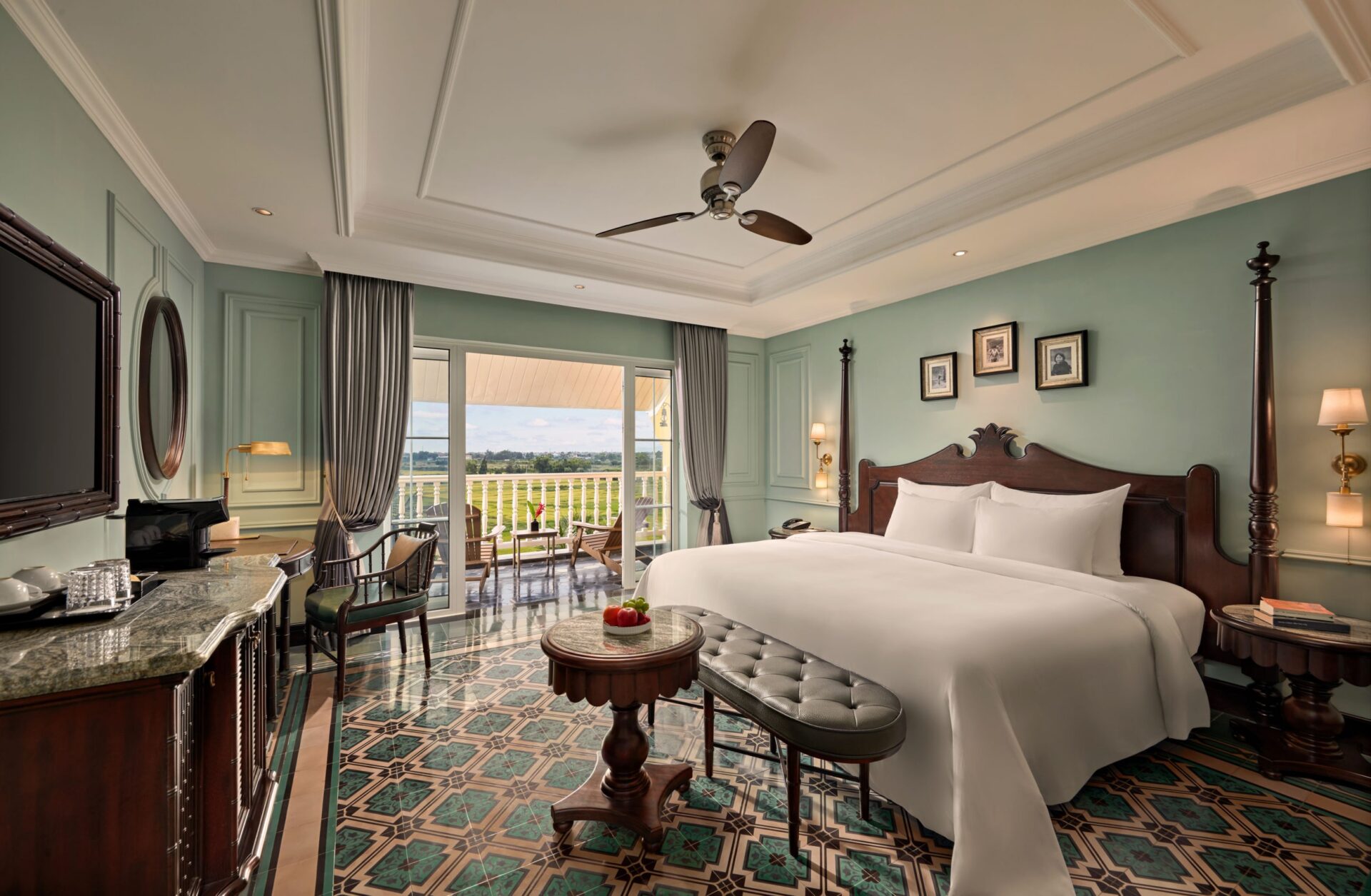 Elegant bedroom with balcony at La Siesta Hoi An Resort