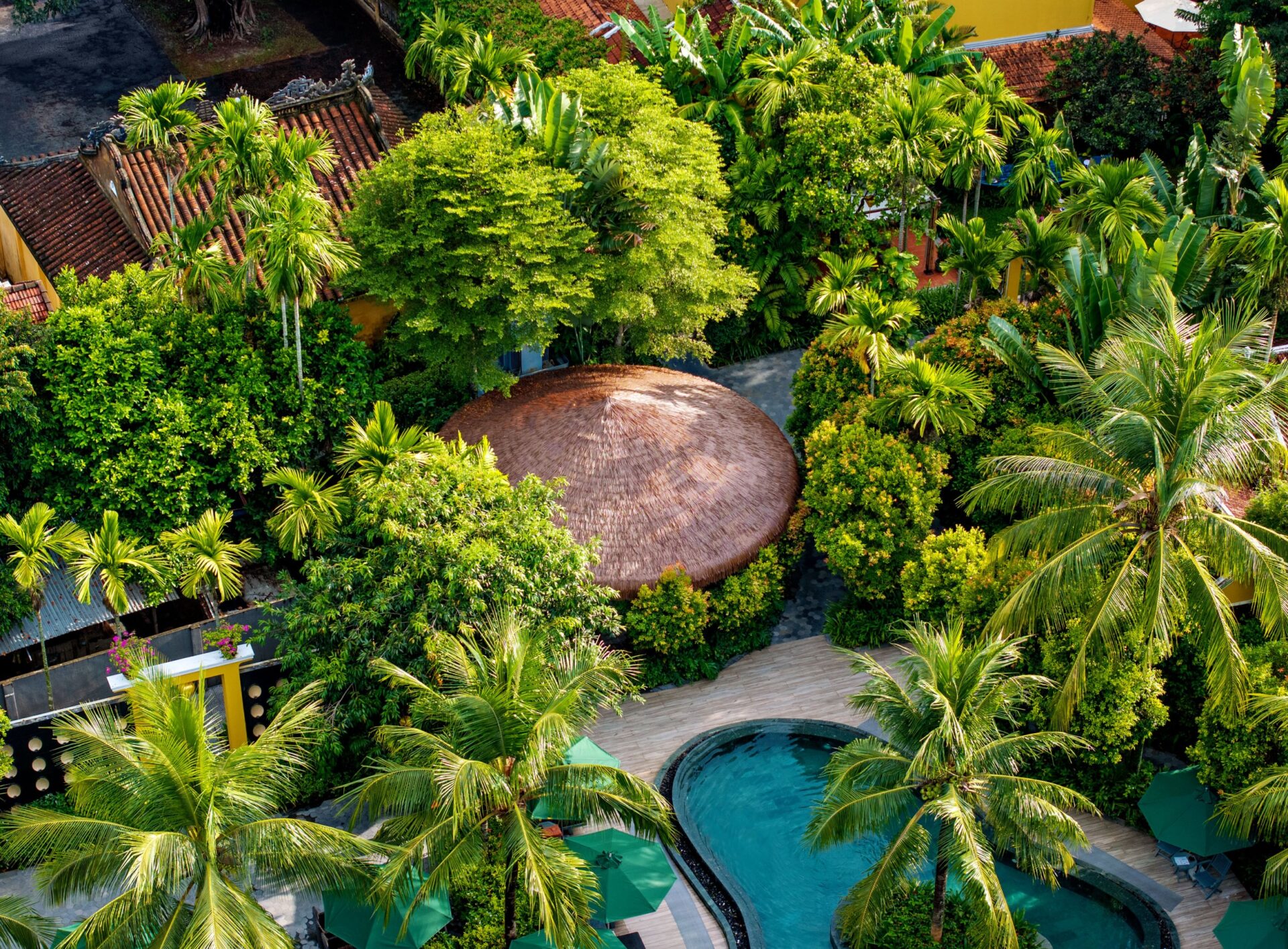 Lush garden and pool at La Siesta Hoi An Resort