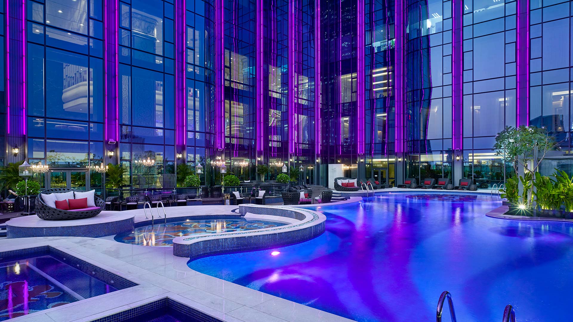 The stunning rooftop swimming pool area at The Reverie Saigon