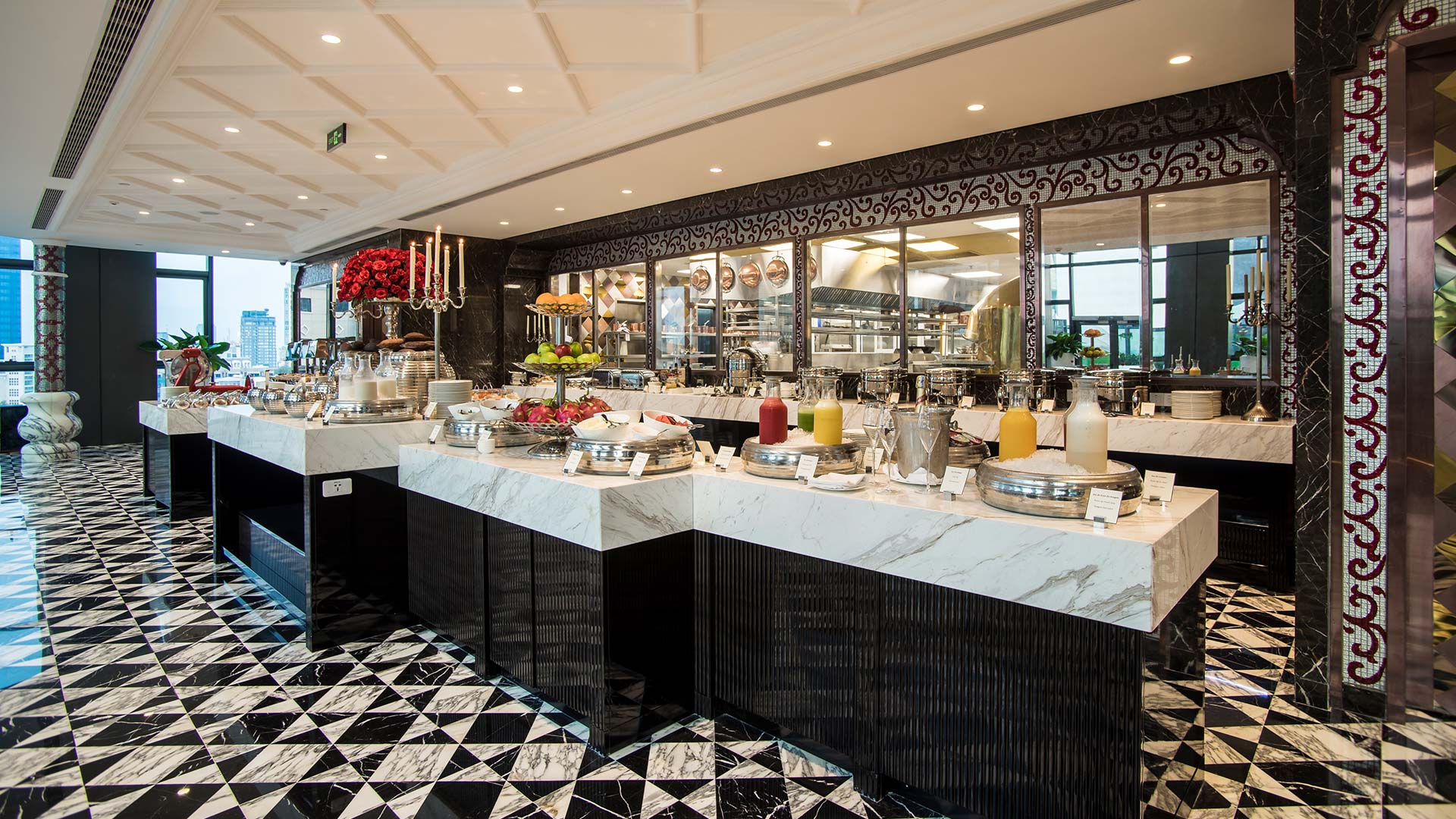 The luxurious breakfast or buffet spread at The Reverie Saigon