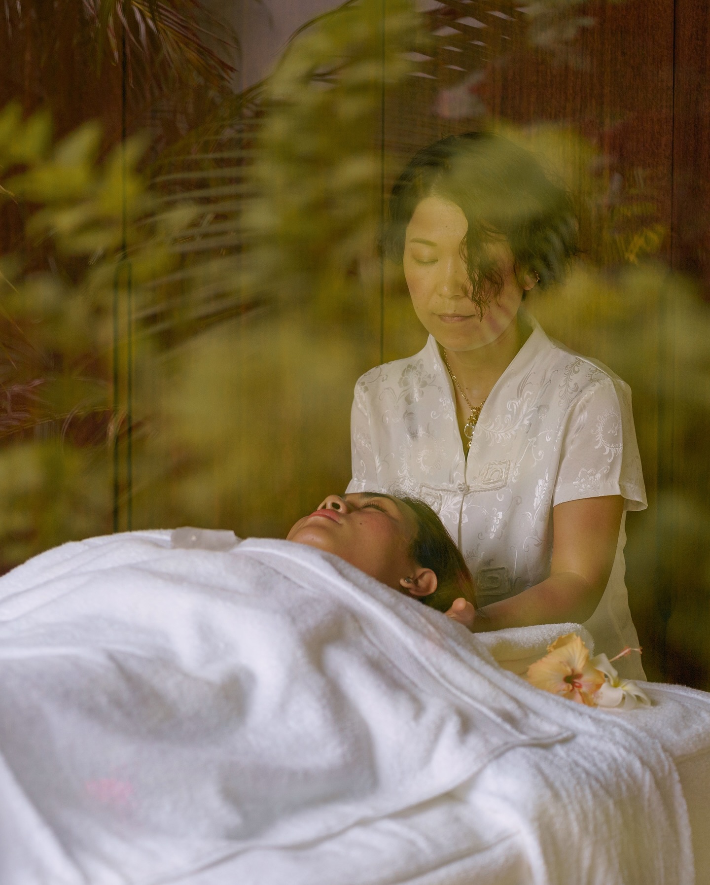 Relaxing spa treatment session with therapist at Four Seasons Resort The Nam Hai, Hoi An.