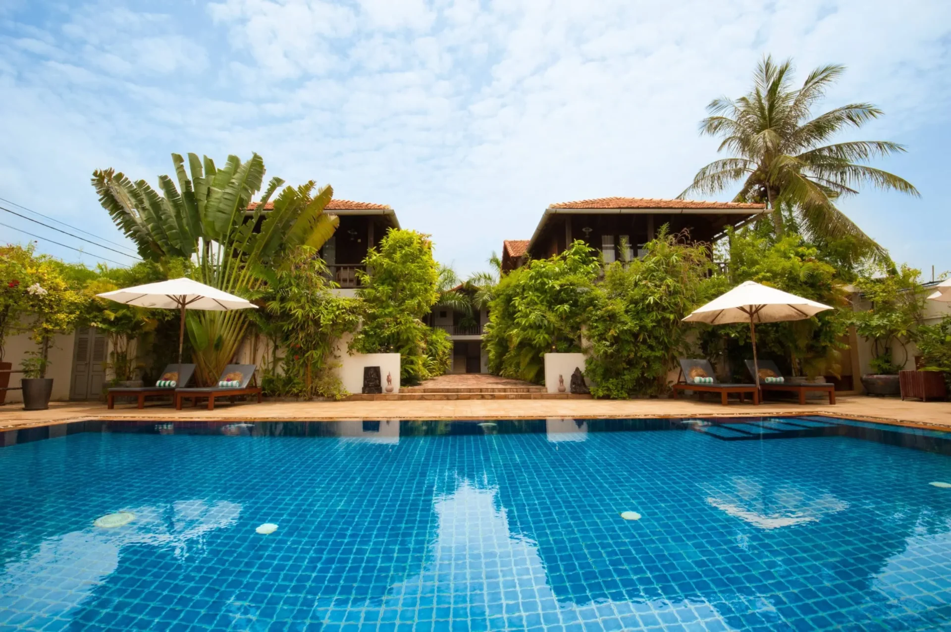The outdoor swimming pool at Bambu Battambang Hotel.
