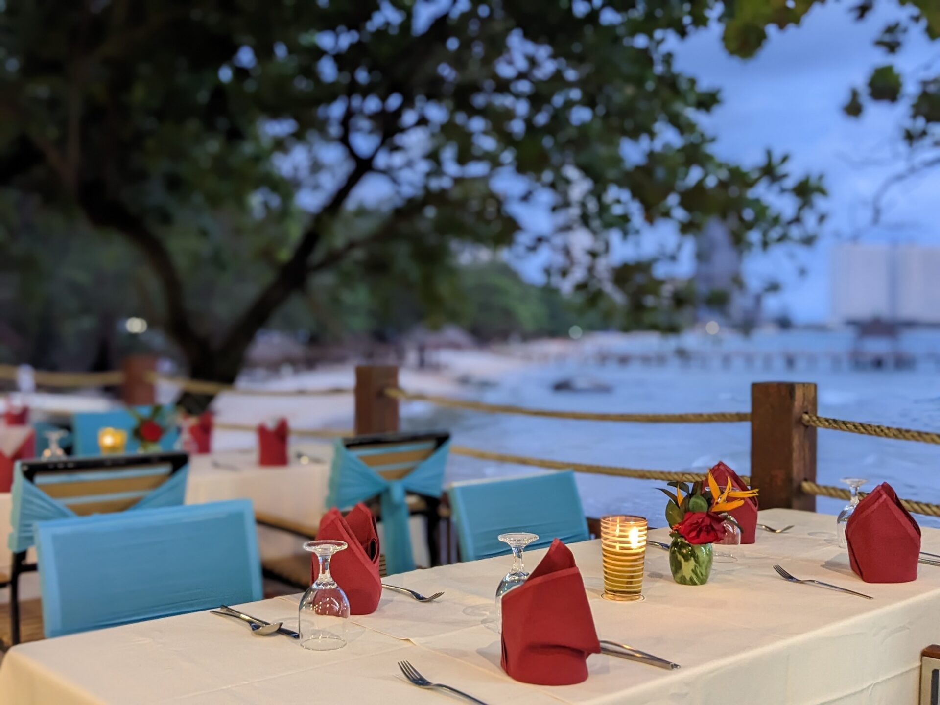 Beachfront bar area at Independence Hotel by Dara overlooking the ocean and resort pool