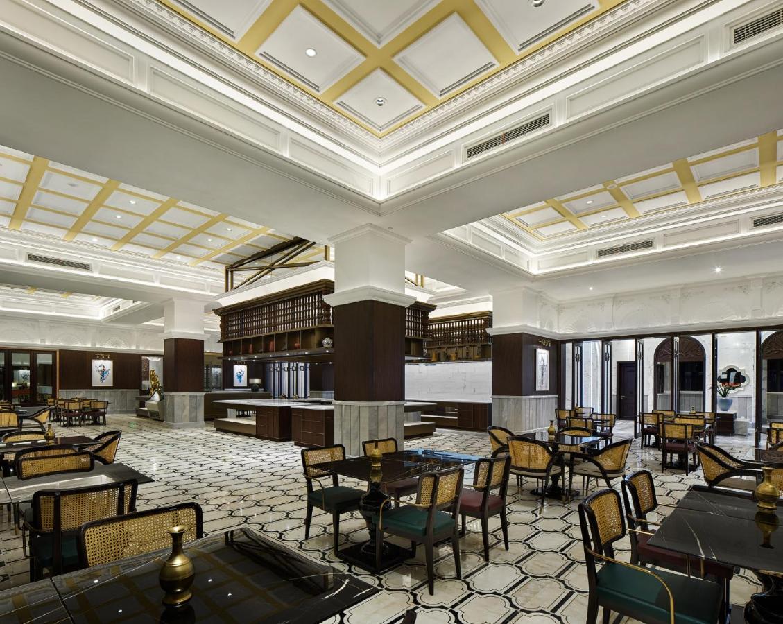Spacious suite living and dining area at Jin Bei Palace Hotel offering refined urban luxury accommodation