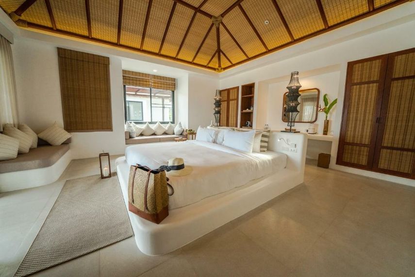 Elegant villa bedroom at The Royal Sands Koh Rong designed with natural materials and soft island tones