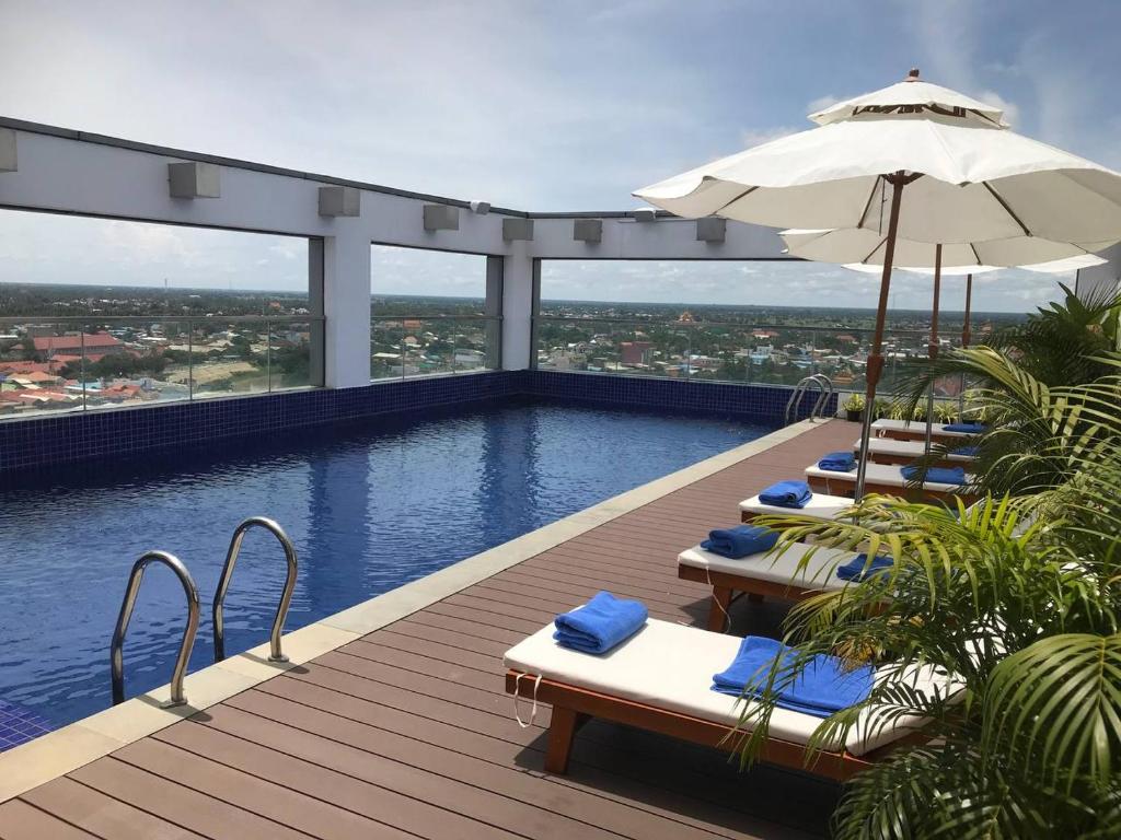 Outdoor swimming pool at V V Hotel Battambang.
