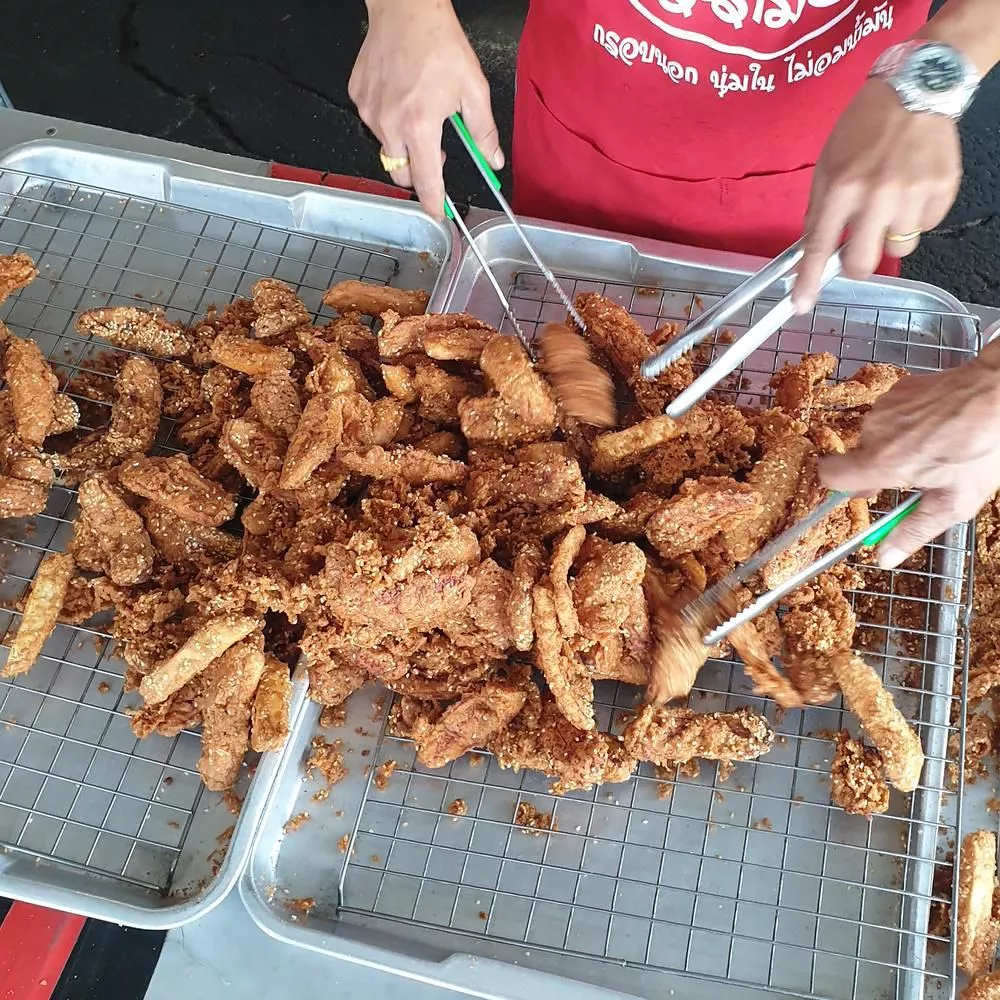 Crispy fried bananas prepared at Bangkok Street Food MICHELIN Restaurants, Fried Banana Rama 5 specialty