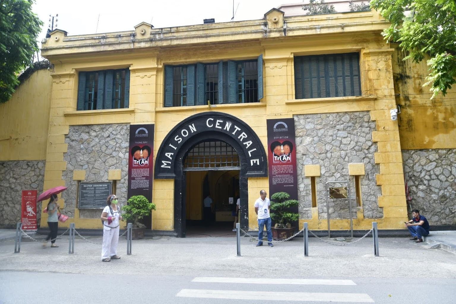 The Many Names of Hanoi Hilton Prison: The entrance to Hoa Lo Prison, showing the historic French colonial name 'MAISON CENTRALE' on the facade.