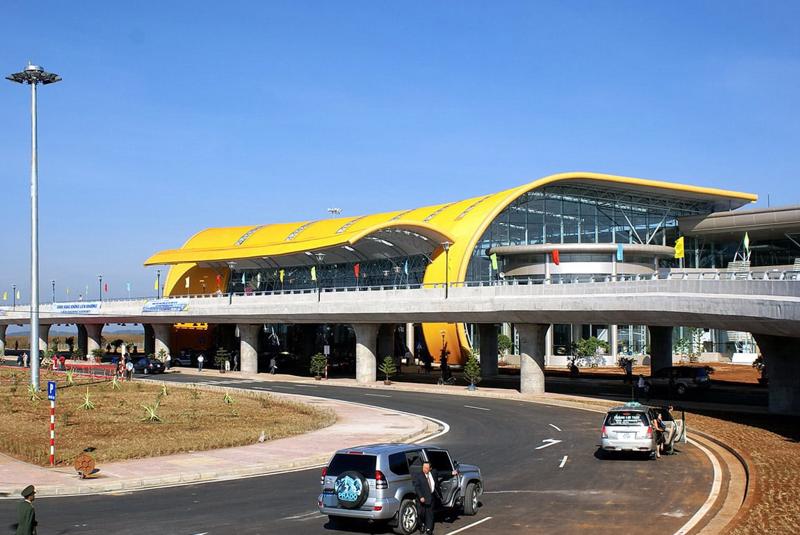 Lien Khuong International Airport (DLI) — Da Lat terminal with distinctive yellow curved roof and elevated roadway access