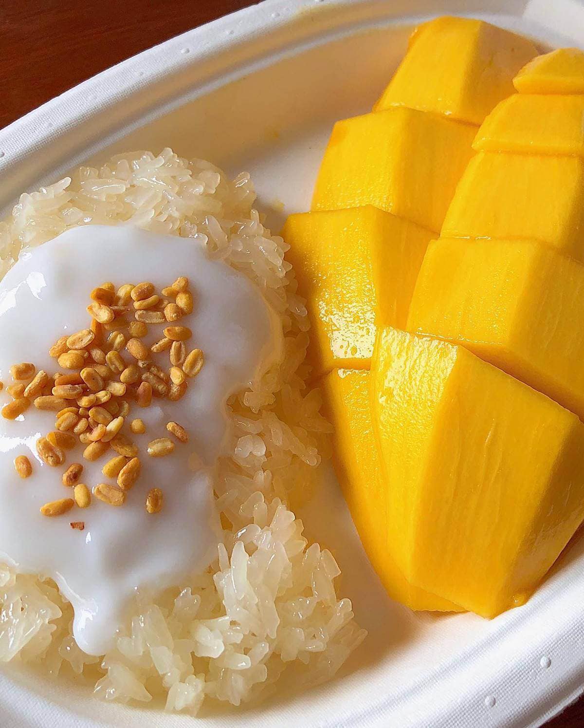 Iconic mango sticky rice at Bangkok Street Food MICHELIN Restaurants, K Panich dessert experience classic