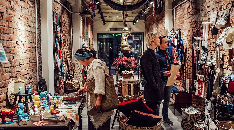 Boutique souvenir shop showcasing local crafts, what to buy in hanoi guide