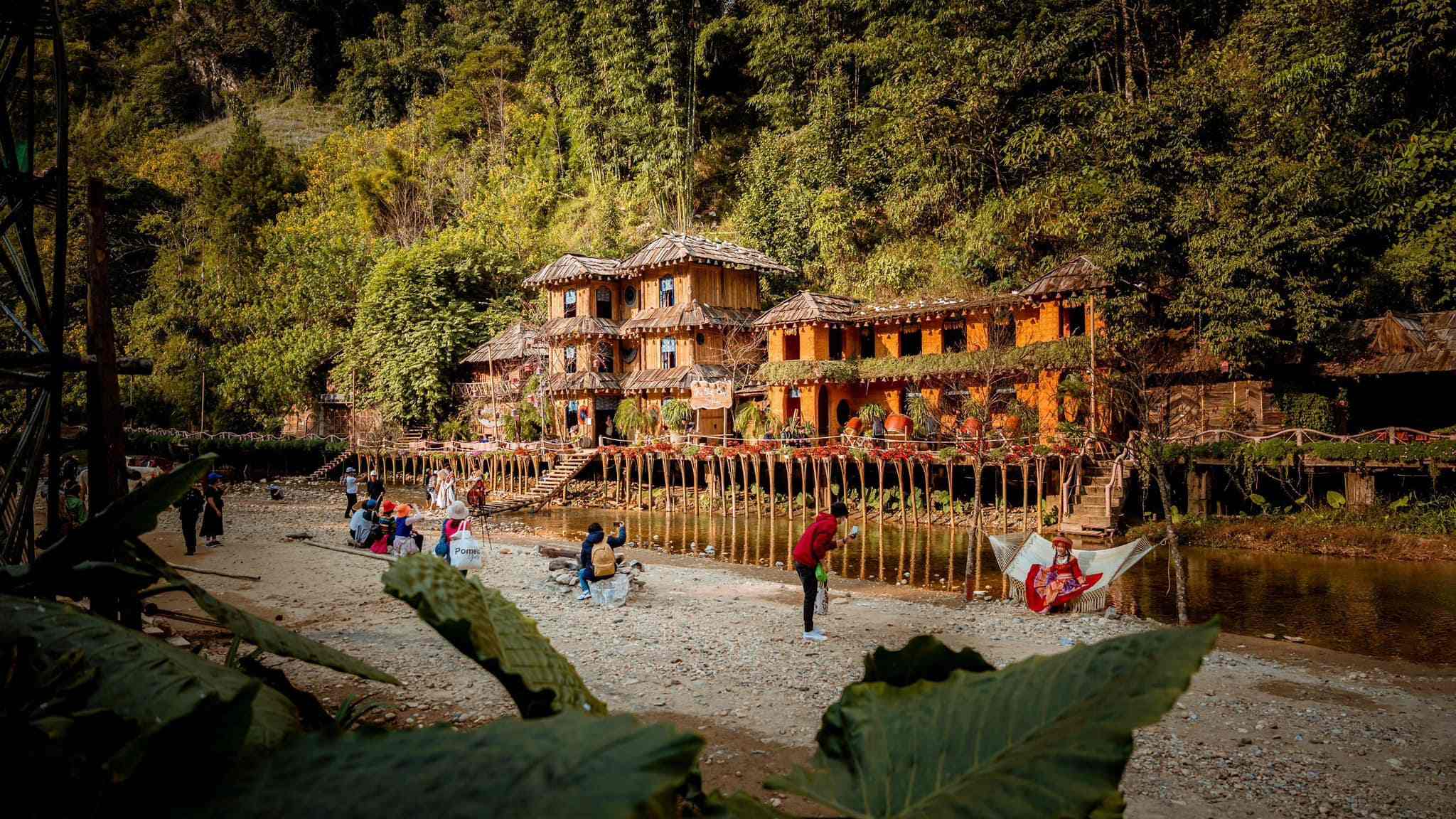 Travelers exploring Cat Cat Village in Sapa, one of the most cultural things to do in Vietnam
