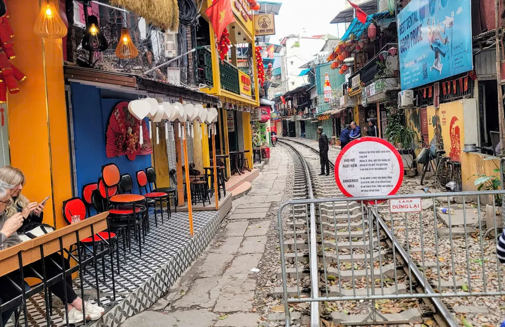 Closed access area on Hanoi train street with safety barrier