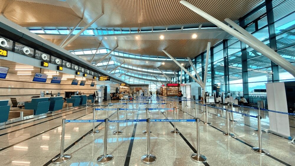 Phu Bai Airport in Hue Vietnam featuring spacious interior, check-in desks, and passenger waiting area