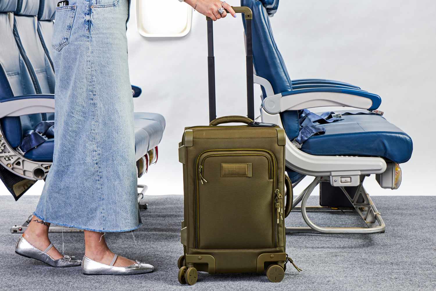 Use a wheeled suitcase to make moving around the airport more convenient.