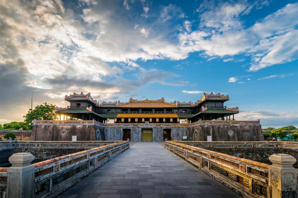 The grand stone entrance and ornate architecture of the Imperial City in Hue, a historical highlight among things to do in Vietnam