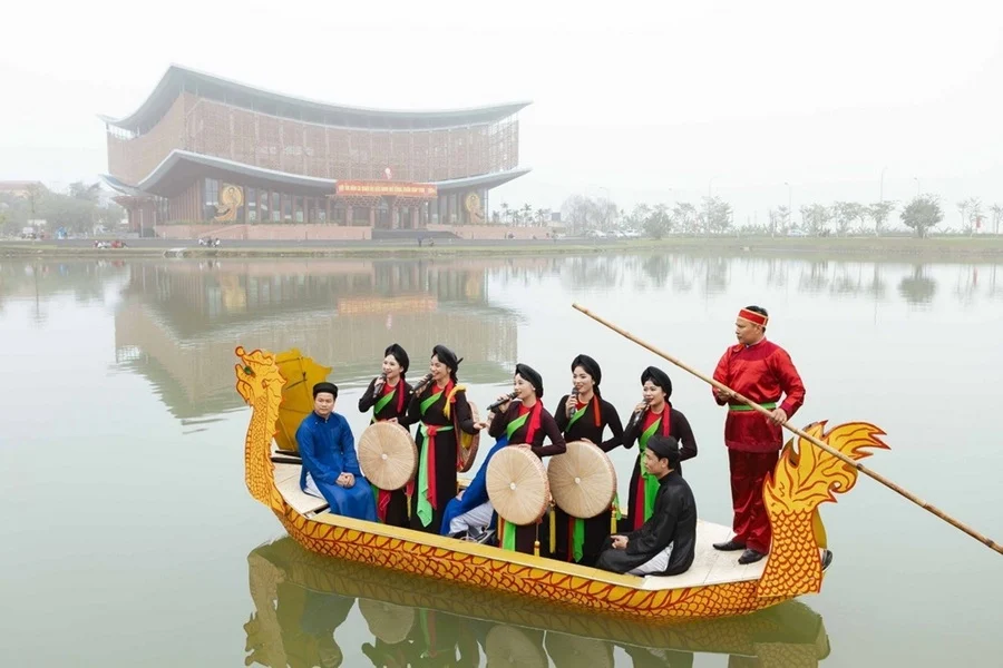 Lim Festival - Bắc Ninh featuring traditional folk singing on boat at temple festival by the lake