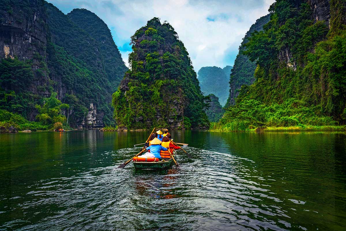 The Trang An Boat Experience - A highlight in Vietnam Tours for Seniors​