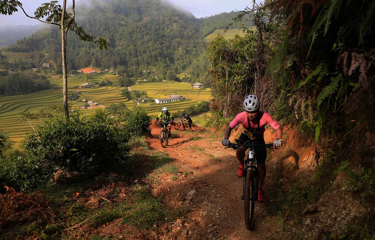 Vietnam bicycle tours through mountain trails and terraced rice fields