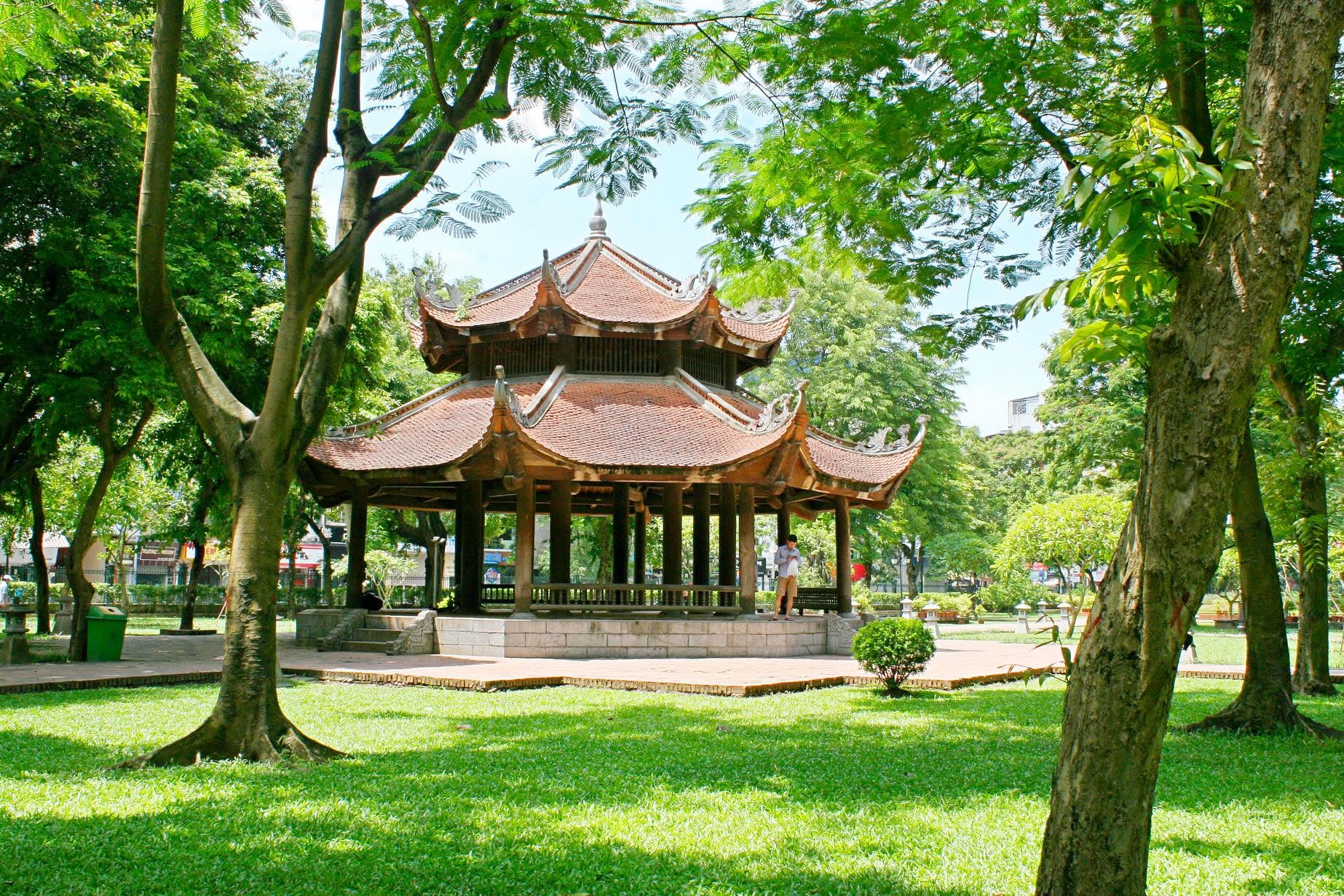 The Imperial Garden features many trees, lawns, and an octagonal house.
