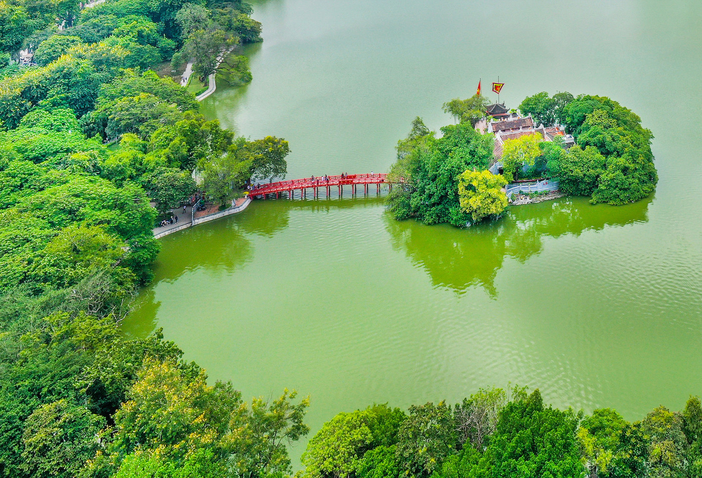 Ngoc Son Temple, viewed from above, with its ancient architecture nestled amidst the serene Hoan Kiem Lake.