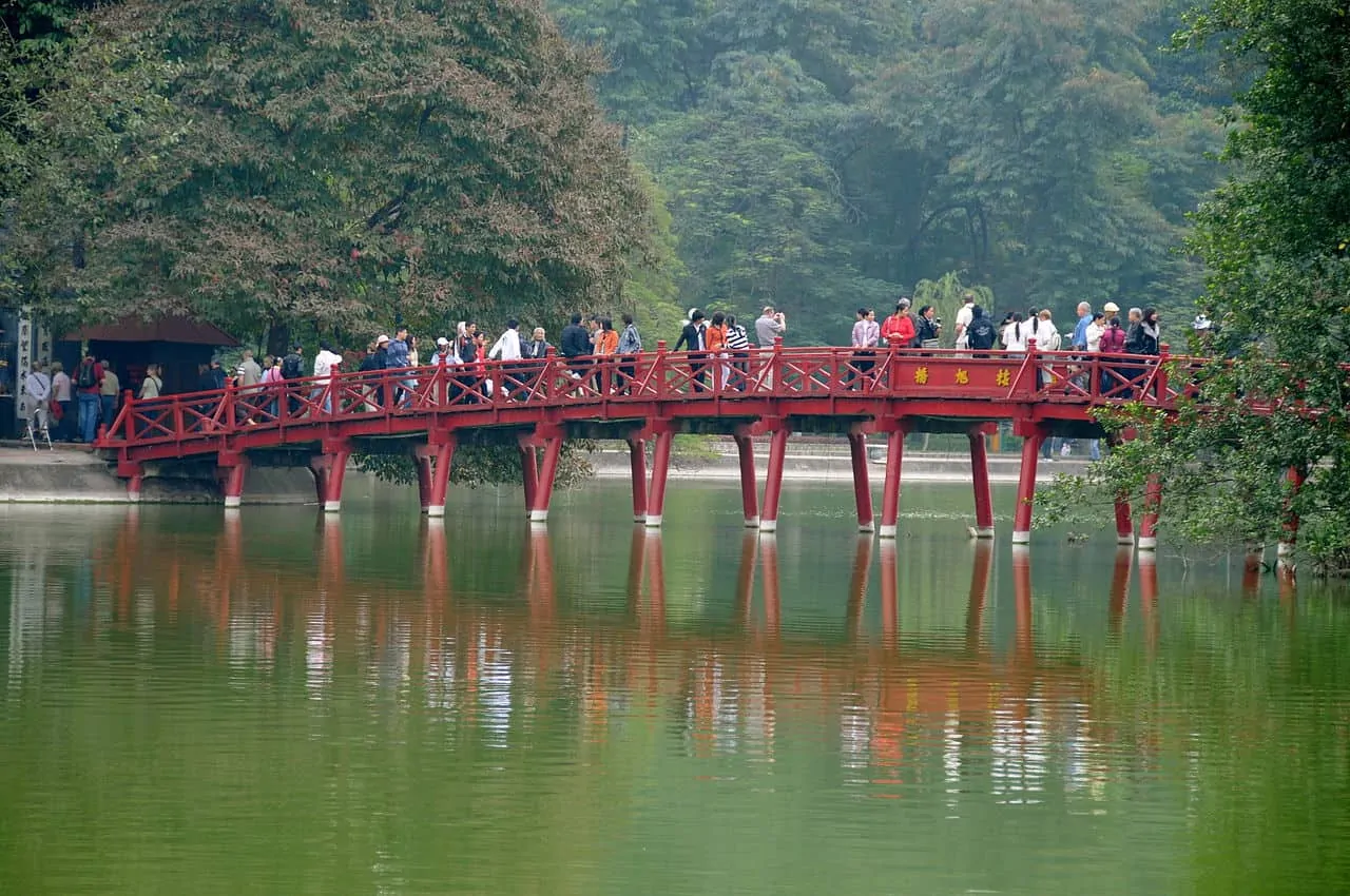 The The Huc Bridge connects the shore of Hoan Kiem Lake with Ngoc Son Temple.